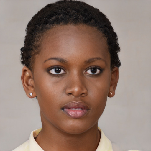 Neutral black young-adult female with short  brown hair and brown eyes