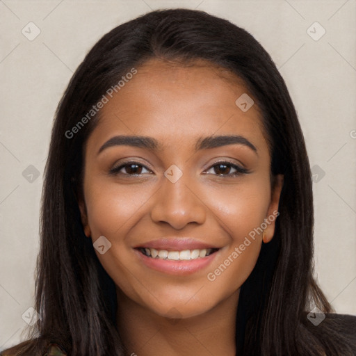 Joyful latino young-adult female with long  brown hair and brown eyes