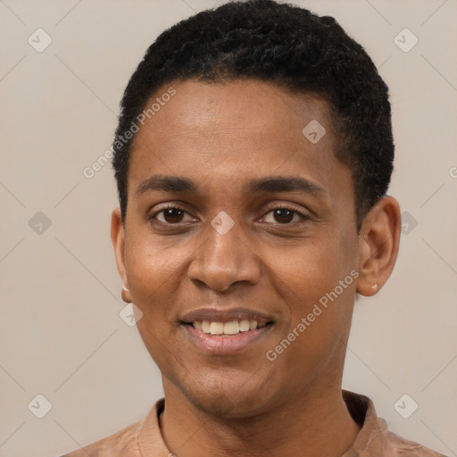 Joyful black young-adult male with short  black hair and brown eyes