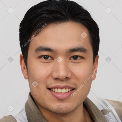 Joyful asian young-adult male with short  brown hair and brown eyes