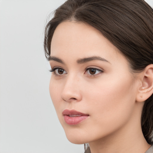 Neutral white young-adult female with medium  brown hair and brown eyes