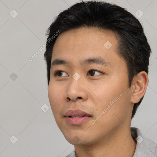 Neutral asian young-adult male with short  black hair and brown eyes