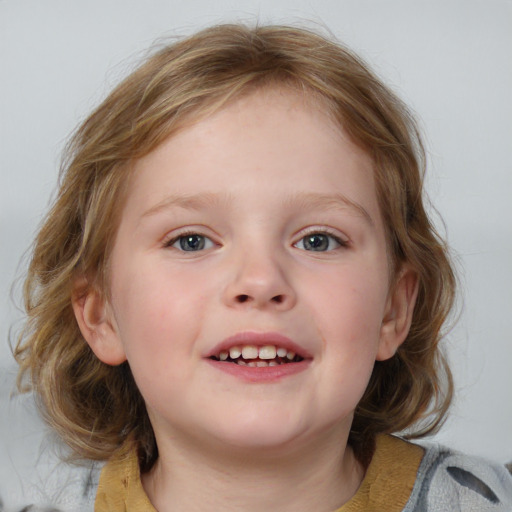 Joyful white child female with medium  brown hair and blue eyes