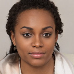 Neutral black young-adult female with short  brown hair and brown eyes