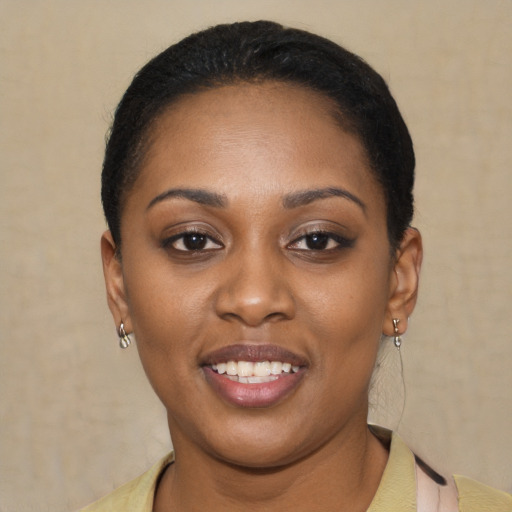 Joyful latino young-adult female with short  black hair and brown eyes