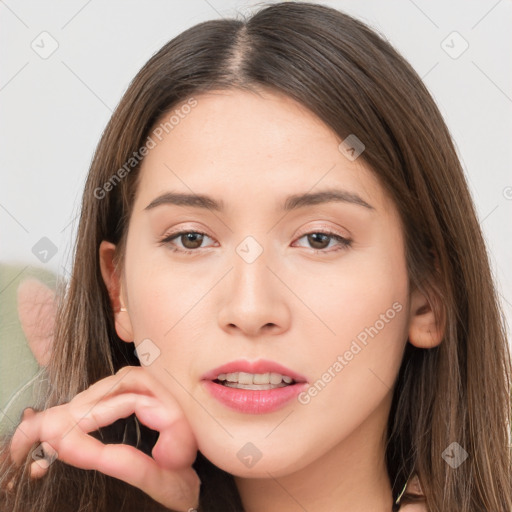 Neutral white young-adult female with long  brown hair and brown eyes