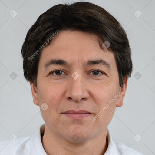 Joyful white adult male with short  brown hair and brown eyes