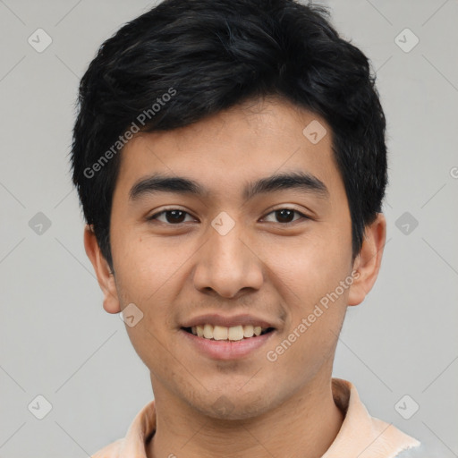 Joyful asian young-adult male with short  black hair and brown eyes