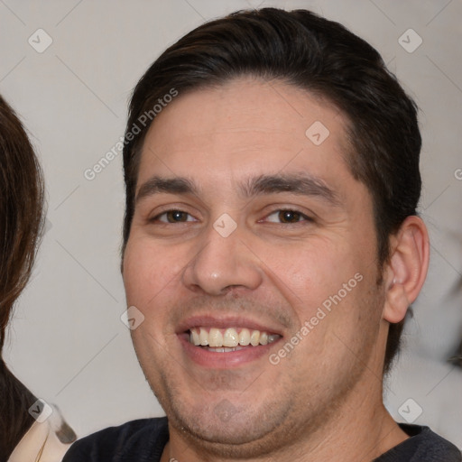 Joyful white young-adult male with short  brown hair and brown eyes