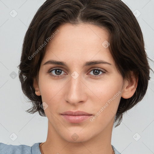 Neutral white young-adult female with medium  brown hair and brown eyes