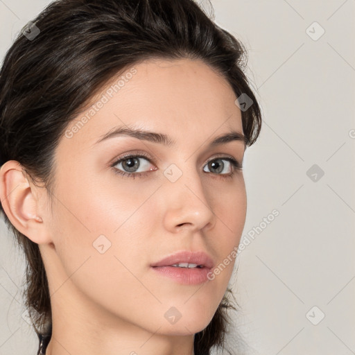 Neutral white young-adult female with medium  brown hair and brown eyes