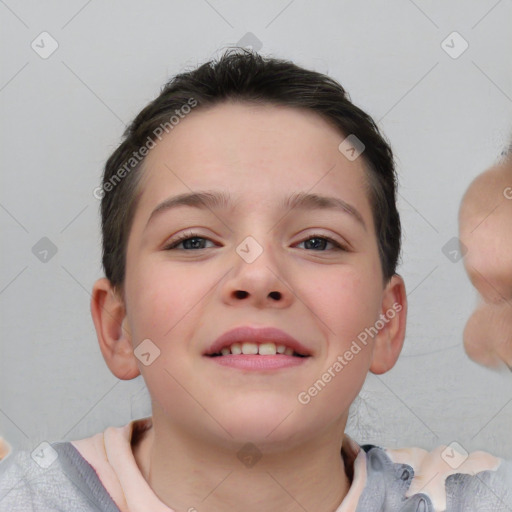 Joyful white child female with short  brown hair and brown eyes