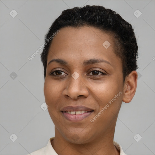 Joyful black young-adult female with short  brown hair and brown eyes