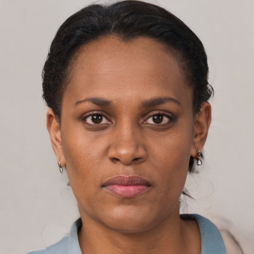 Neutral black young-adult female with short  brown hair and brown eyes
