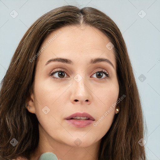 Neutral white young-adult female with long  brown hair and brown eyes