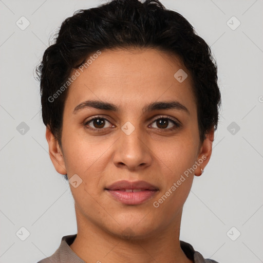 Joyful latino young-adult female with short  brown hair and brown eyes