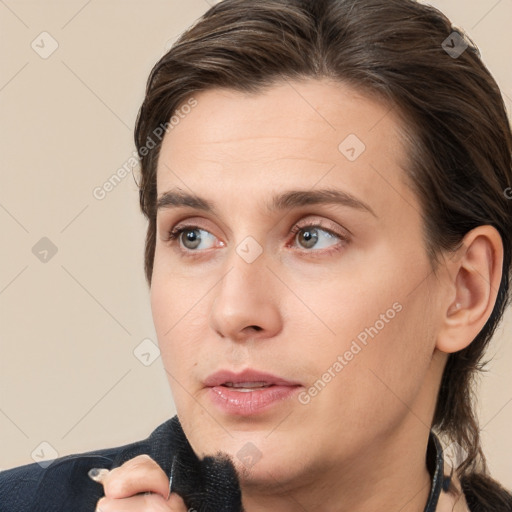 Neutral white young-adult female with medium  brown hair and brown eyes