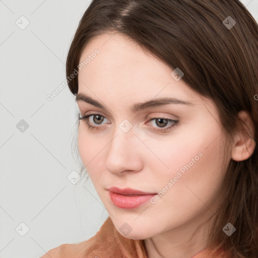 Neutral white young-adult female with medium  brown hair and brown eyes