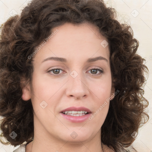 Joyful white young-adult female with medium  brown hair and green eyes