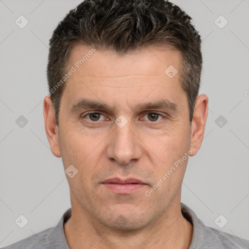 Neutral white adult male with short  brown hair and brown eyes