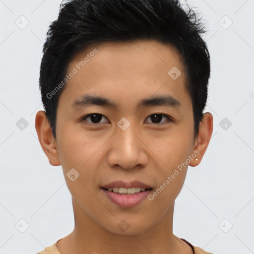 Joyful asian young-adult male with short  brown hair and brown eyes