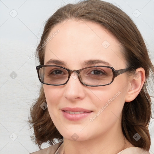 Joyful white young-adult female with medium  brown hair and blue eyes