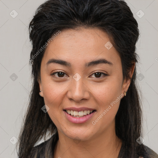 Joyful asian young-adult female with long  brown hair and brown eyes