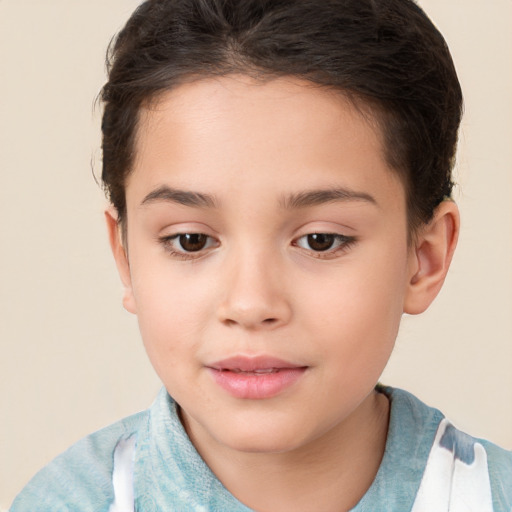 Joyful white child female with short  brown hair and brown eyes