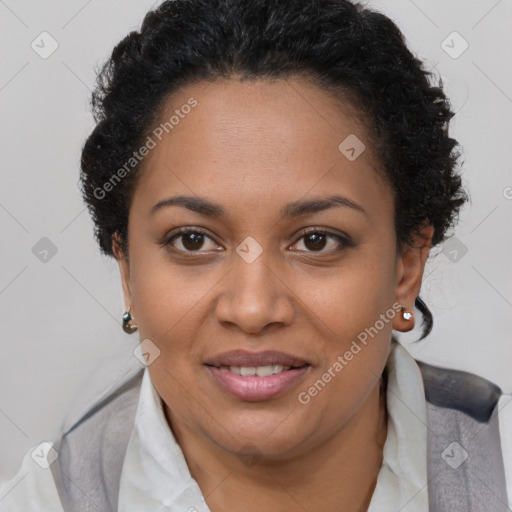 Joyful black adult female with short  brown hair and brown eyes