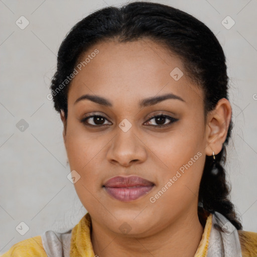 Joyful latino young-adult female with long  brown hair and brown eyes