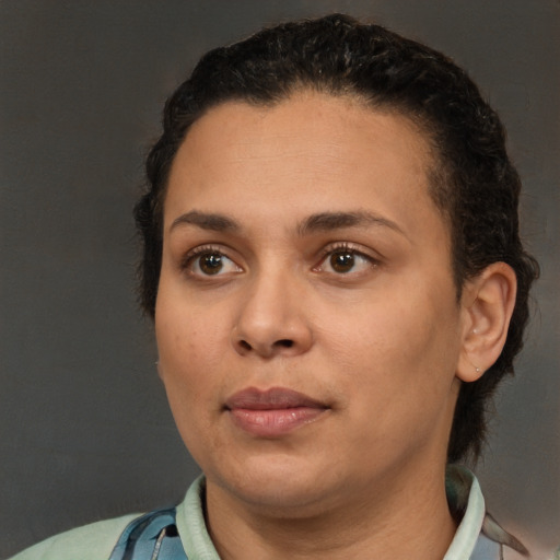 Neutral white young-adult female with short  brown hair and brown eyes