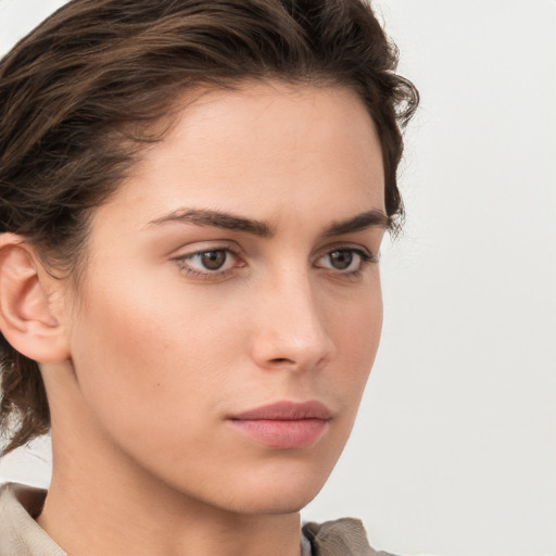 Neutral white young-adult female with short  brown hair and brown eyes