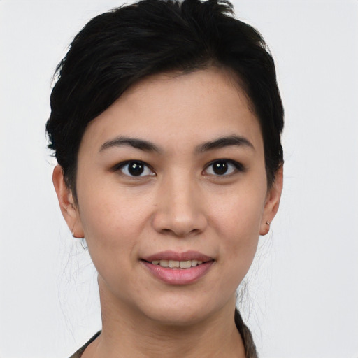 Joyful white young-adult female with short  black hair and brown eyes