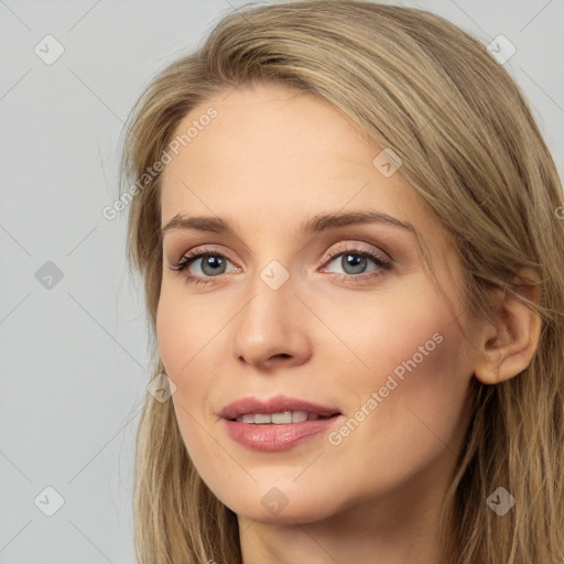 Joyful white young-adult female with long  brown hair and grey eyes