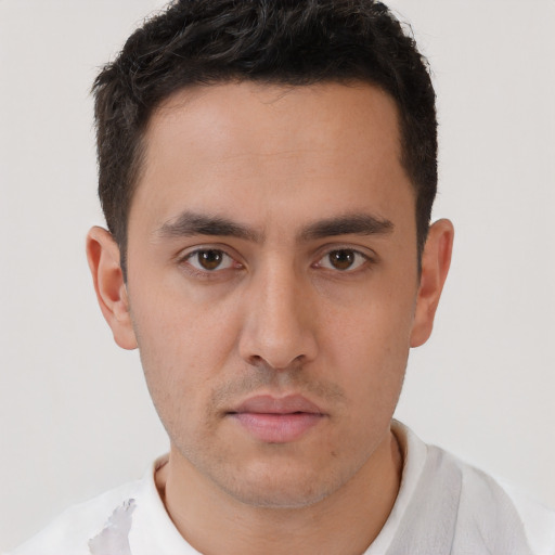 Neutral white young-adult male with short  brown hair and brown eyes