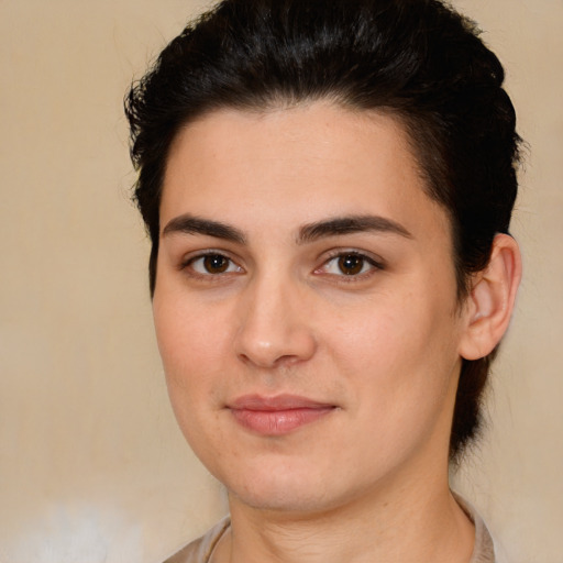 Joyful white young-adult female with medium  brown hair and brown eyes