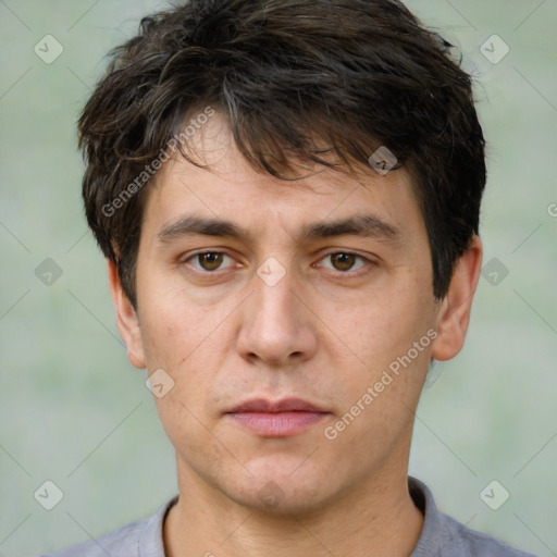 Neutral white young-adult male with short  brown hair and brown eyes