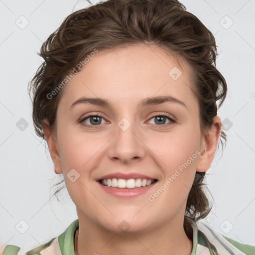 Joyful white young-adult female with medium  brown hair and green eyes