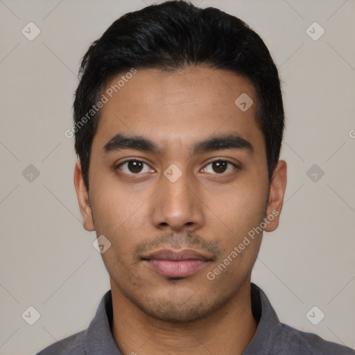 Neutral latino young-adult male with short  black hair and brown eyes