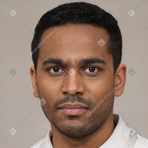 Neutral latino young-adult male with short  black hair and brown eyes