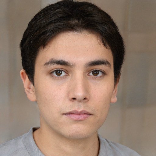 Neutral asian young-adult male with short  brown hair and brown eyes