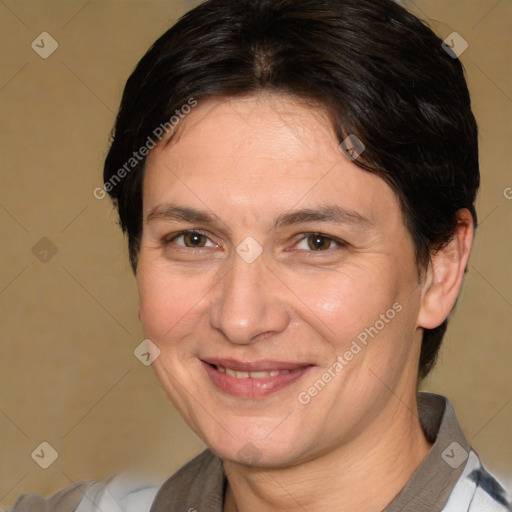 Joyful white adult female with medium  brown hair and brown eyes