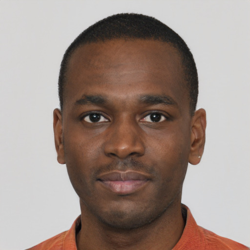 Neutral black young-adult male with short  brown hair and brown eyes