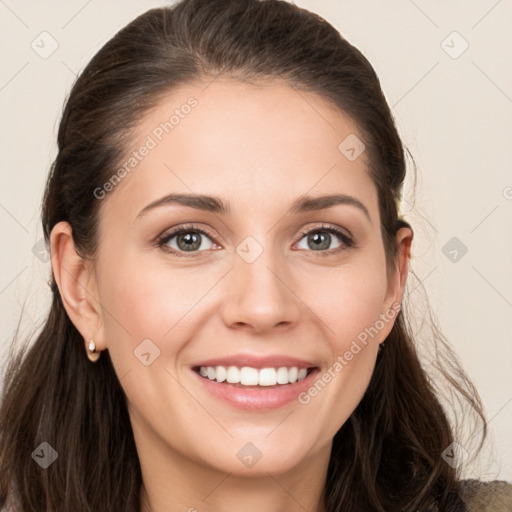 Joyful white young-adult female with long  brown hair and grey eyes