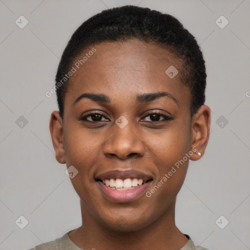 Joyful black young-adult female with short  black hair and brown eyes