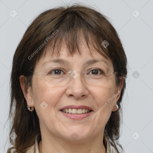 Joyful white adult female with medium  brown hair and grey eyes