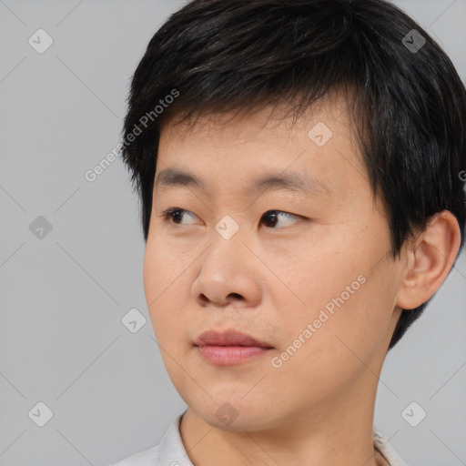 Neutral asian young-adult male with short  black hair and brown eyes