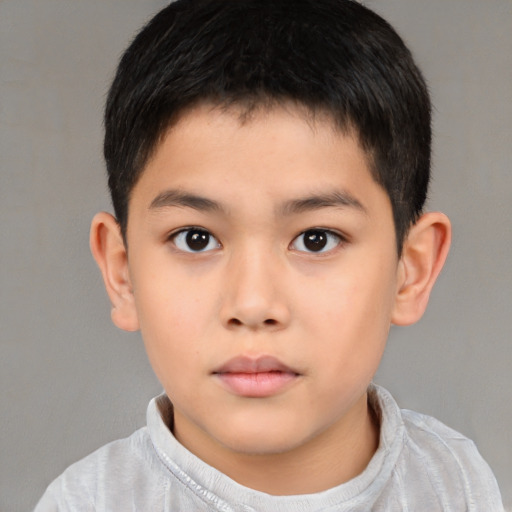 Neutral asian child male with short  brown hair and brown eyes