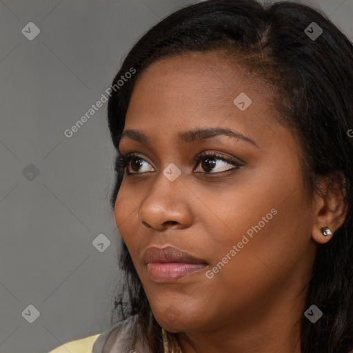 Neutral black young-adult female with long  black hair and brown eyes