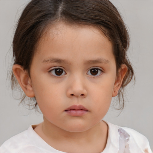 Neutral white child female with medium  brown hair and brown eyes